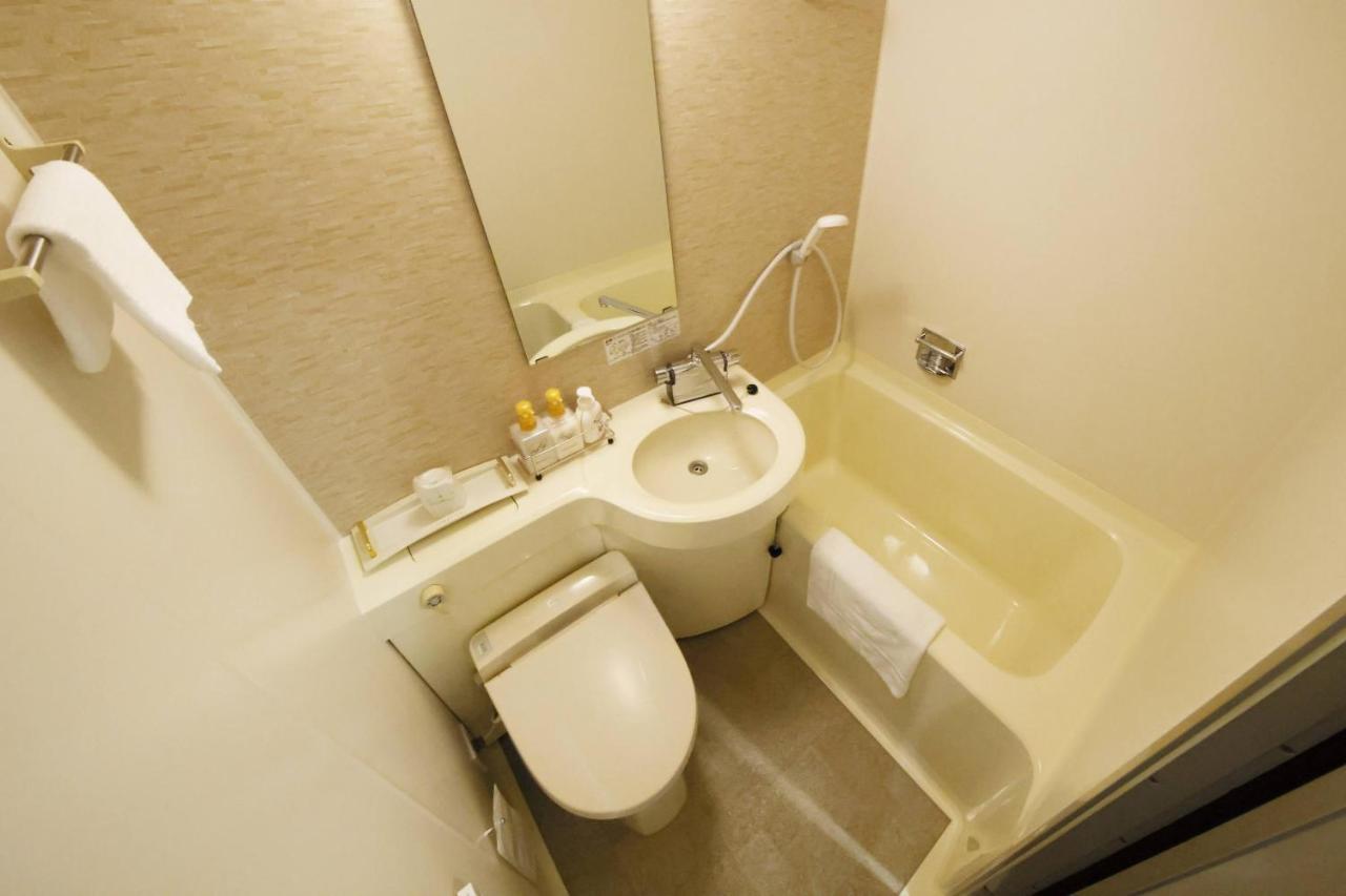 Business Hotel New Daiei آسْكَغَ المظهر الخارجي الصورة